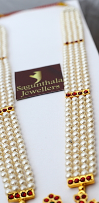 Brass Gold Finish Temple Haram with Artificial Kempstones & Pearls – Traditional Long Necklace Brass Gold Finish Temple Haram with Artificial Kempstones & Pearls – Traditional Long Necklace