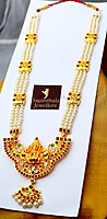 Temple Jewellery - Pearls three lines Haram with Kempstones Goddess Lakshmi Pendant Temple Jewellery - Pearls three lines Haram with Kempstones Goddess Lakshmi Pendant